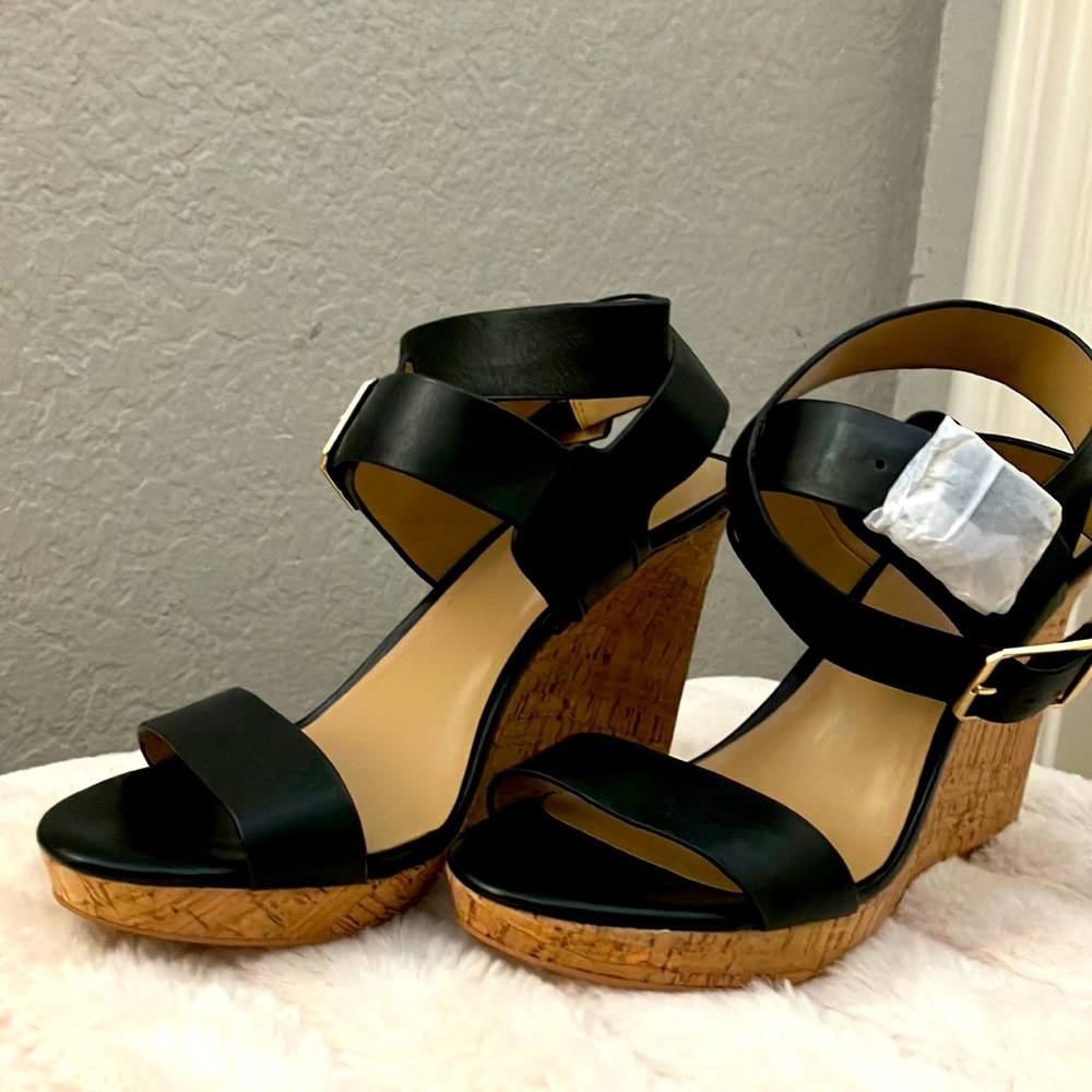 NIB.  Ann Taylor Leather and Cork Black Wedge. Size 7